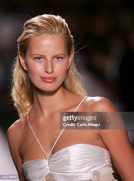 Models walk down the runway at the Caroline Herrera show during Olympus Fashion Week Spring 2005 at Bryant Park September 9, 2004 in New York City.