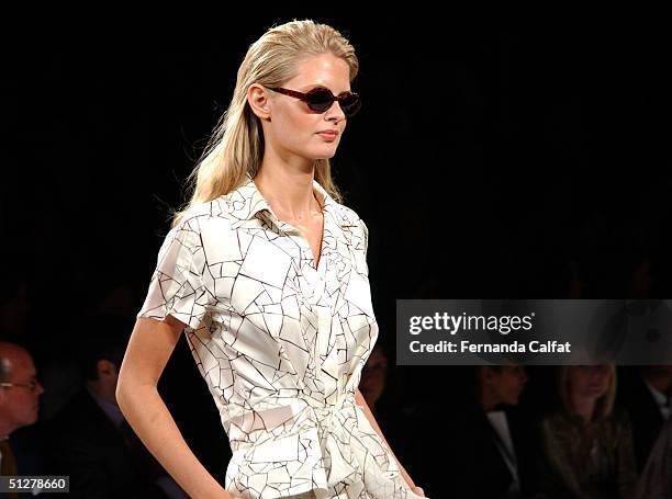 Models walk down the runway at the Caroline Herrera show during Olympus Fashion Week Spring 2005 at Bryant Park September 9, 2004 in New York City.