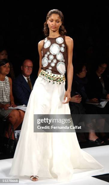 Models walk down the runway at the Caroline Herrera show during Olympus Fashion Week Spring 2005 at Bryant Park September 9, 2004 in New York City.