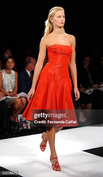 Models walk down the runway at the Caroline Herrera show during Olympus Fashion Week Spring 2005 at Bryant Park September 9, 2004 in New York City.