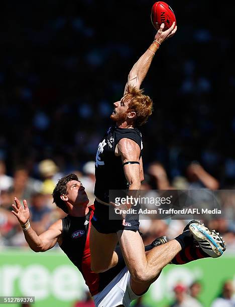 Sam Michael of the Bombers and Andrew Phillips of the Blues compete in a ruck contest during the 2016 NAB Challenge match between the Carlton Blues...