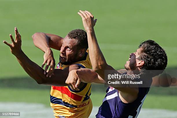 Cam Ellis-Yolmen of the Crows contests for the ball with Alex Silvagni of the Dockers during the 2016 AFL NAB Challenge match between the Fremantle...