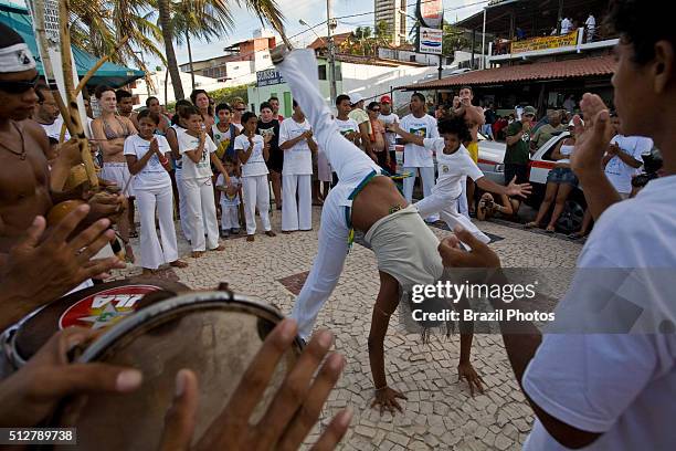 Capoeira, a Brazilian martial art that combines elements of dance, acrobatics and music, and is usually referred to as a game - known for quick and...