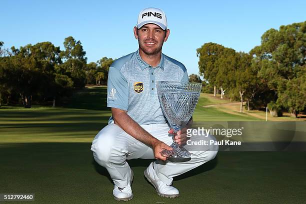 Louis Oosthuizen of South Africa poses with the trophy after winning the 2016 Perth International at Karrinyup GC on February 28, 2016 in Perth,...