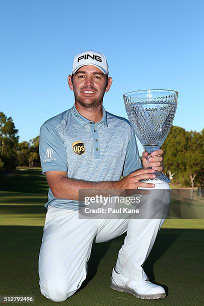 Louis Oosthuizen of South Africa poses with the trophy after winning the 2016 Perth International at Karrinyup GC on February 28, 2016 in Perth,...