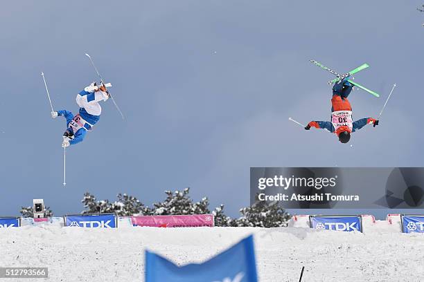 Bryon Wilson of the USA and Taisei Watanabe of Japan compete in Men's Dual Mogul during the FIS Freestyle Ski World Cup Tazawako In Akita supported...