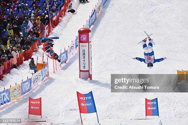 Bryon Wilson of the USA and Taisei Watanabe of Japan compete in Men's Dual Mogul during the FIS Freestyle Ski World Cup Tazawako In Akita supported...