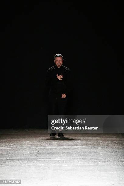 Designer Alberto Zambelli acknowledges the applause of the audience at the Alberto Zambelli show during Milan Fashion Week Fall/Winter 2016/17 on...