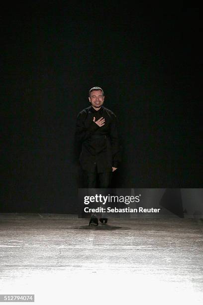 Designer Alberto Zambelli acknowledges the applause of the audience at the Alberto Zambelli show during Milan Fashion Week Fall/Winter 2016/17 on...