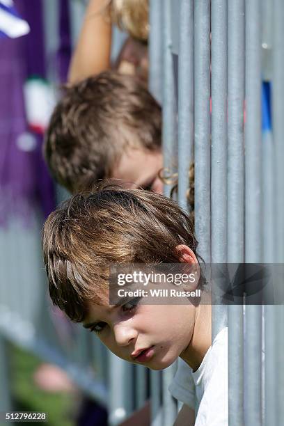 Fan sticks his head through the railings during the 2016 AFL NAB Challenge match between the Fremantle Dockers and the Adelaide Crows at Sounness...