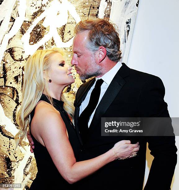 Jessica Simpson and Eric Johnson attend the "Tom Everhart "Raw" Exhibition of His Schulz-influenced Paintings For The First Time In Black And White...