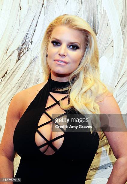 Jessica Simpson attends the "Tom Everhart "Raw" Exhibition of His Schulz-influenced Paintings For The First Time In Black And White At Mouche Gallery...