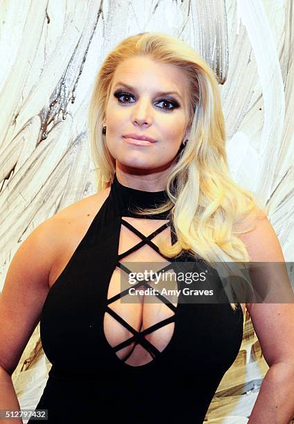 Jessica Simpson attends the "Tom Everhart "Raw" Exhibition of His Schulz-influenced Paintings For The First Time In Black And White At Mouche Gallery...