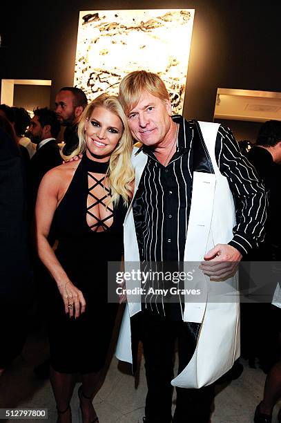 Jessica Simpson and Joe Simpson attend the "Tom Everhart "Raw" Exhibition of His Schulz-influenced Paintings For The First Time In Black And White At...