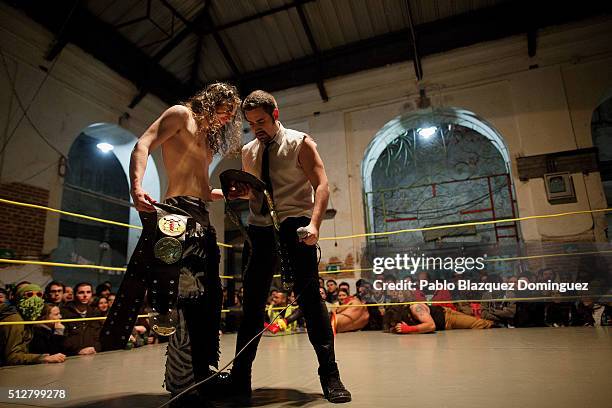 Fighters Orion and Elvis Harrison hold their belts during The Triple W's 'Venon' show at Tabacalera on February 27, 2016 in Madrid, Spain. Lovers of...