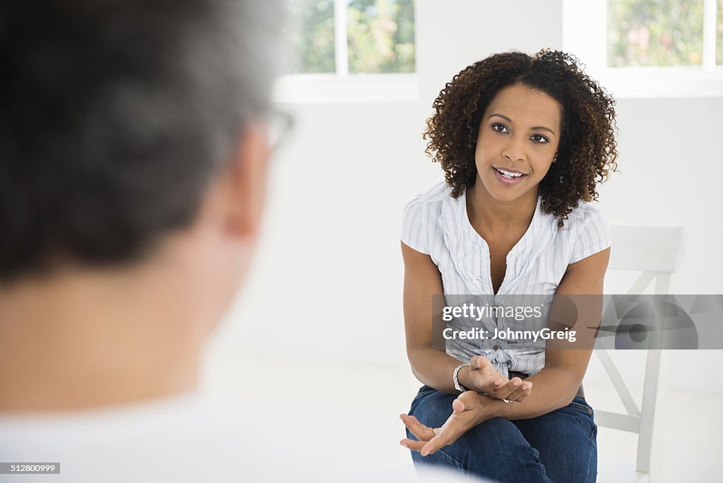 Woman talking at interview