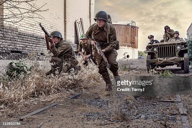 world war ii soldiers looking for the enemy - world war ii stock pictures, royalty-free photos & images