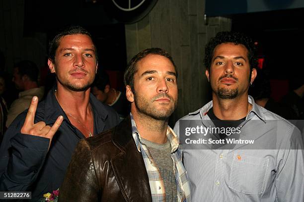 Actors Simon Rex and Jeremy Piven pose at the Maxim Magazine's Music Issue Party during Olympus Fashion Week Spring 2005 on September 9, 2004 at...