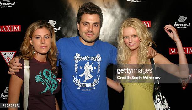 Model Lydia Hearst with guests pose at the Maxim Magazine's Music Issue Party during Olympus Fashion Week Spring 2005 on September 9, 2004 at Crobar,...