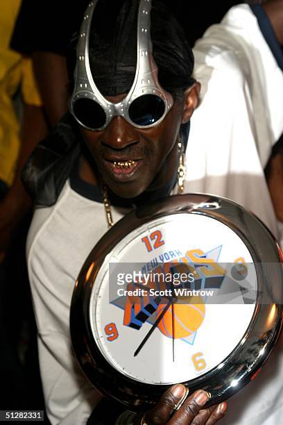 Rapper Flavor Flav poses at Maxim Magazine's Music Issue Party during Olympus Fashion Week Spring 2005 on September 9, 2004 at Crobar, in New York...
