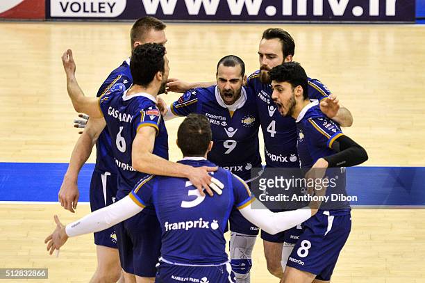 Team of Paris celebrate during the French Ligue A match between Paris Volley v Cannes at Salle Pierre Charpy on February 27, 2016 in Paris, France.