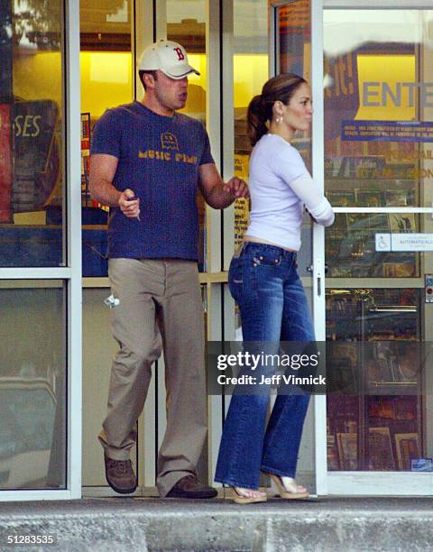 Actors Jennifer Lopez and Ben Affleck leave a video store together after renting some DVD's June 29, 2003 in Vancouver, Canada.