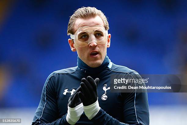 Harry Kane of Tottenham Hotspur looks on with a protective face mask prior to the Barclays Premier League match between Tottenham Hotspur and Swansea...