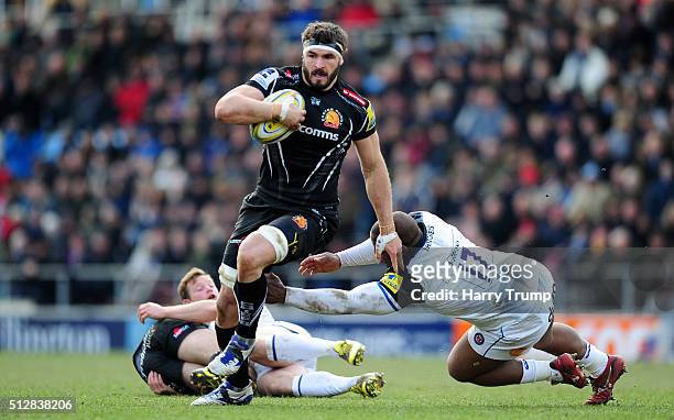 Don Armand of Exeter Chiefs looks to break past Nick Auterac of Bath Rugby during the Aviva Premiership match between Exeter Chiefs and Bath Rugby at...