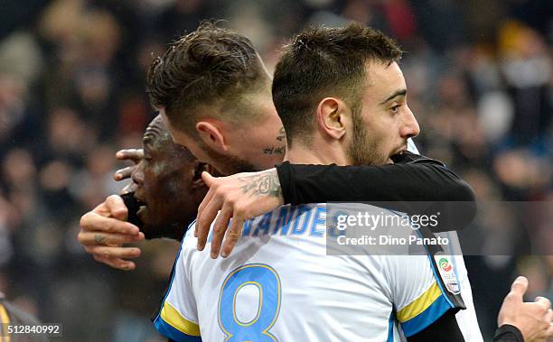 Emmanuel Agyemang Badu of Udinese Calcio celebrates with his team's mate Bruno Fernandes Borges after scoring his team's opening goal during the...