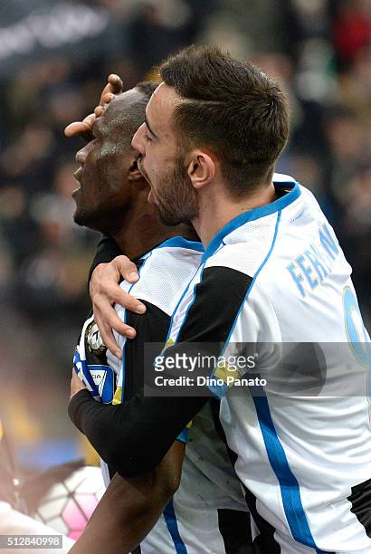 Emmanuel Agyemang Badu of Udinese Calcio celebrates with his team's mate Bruno Fernandes Borges after scoring his team's opening goal during the...