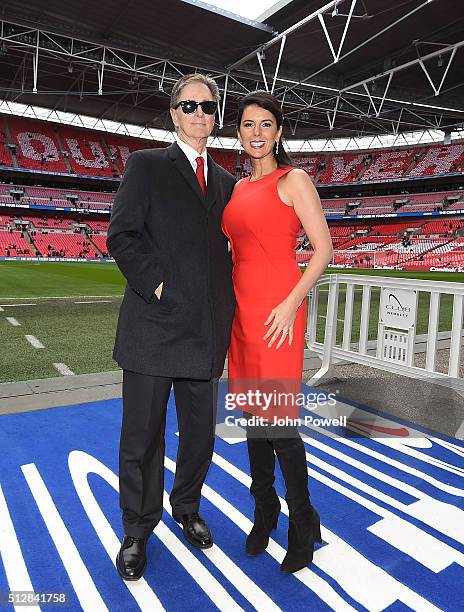 John W Henry Owner of Liverpool FC with wife Linda Pizzuti inside Wembley Stadium before the Capital One Cup Final match between Liverpool and...