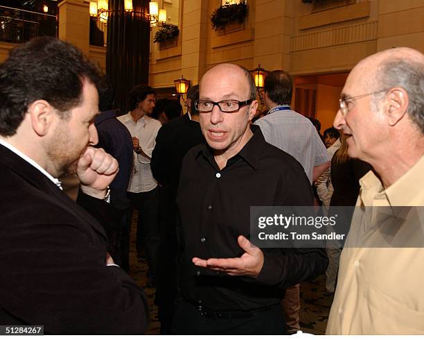 Head of U.S. Distribution for ThinkFilm Mark Urman talks with director and filmmaker Barry Avrich and Chairman of the Toronto International Film Fest...