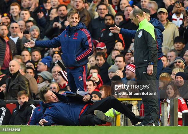 Louis van Gaal, Manager of Manchester United makes a point to the fourth official during the Barclays Premier League match between Manchester United...