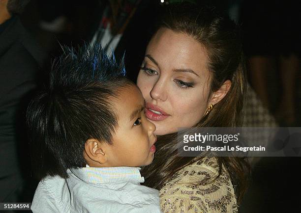 Actress Angelina Jolie and her son Maddox attend the World Premiere of "Shark Tale" in San Marco Square, as part of the 61st Venice Film Festival on...