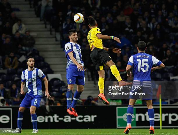 Abameyang of Borussia and Ruben Neves of Porto in action during the UEFA Europa League match between FC Porto and Borússia Dortmund at Dragao Stadium...