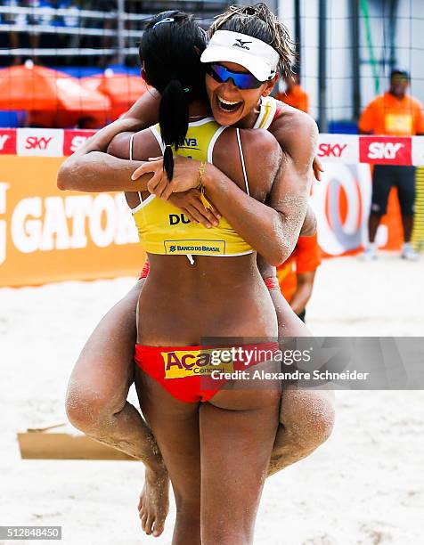 Elize Maia and Duda Lisboaof Brazil celebrate their victory after winning the golden medal match against Netherlands at Pajucara beach during day six...