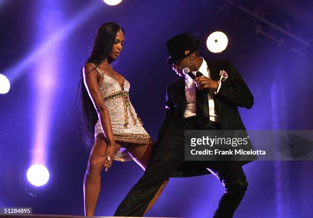 Usher and Naomi Campbell perform onstage at the "Fashion Rocks" concert held at Radio City Music Hall on September 8, 2004 in New York City. Campbell...