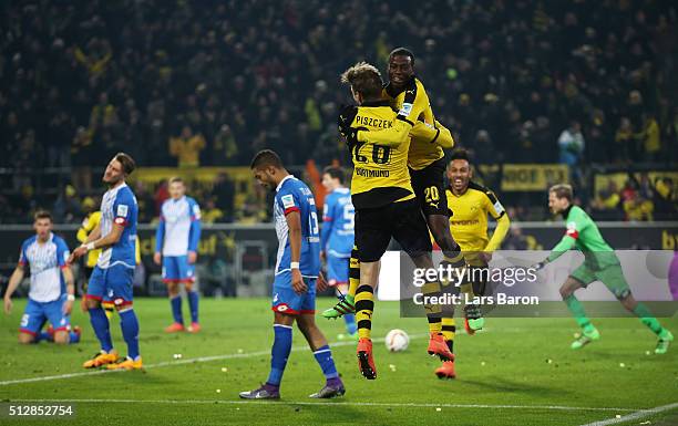 Adrian Ramos of Borussia Dortmund celebrates scoring his team's second goal with Lukasz Piszczek during the Bundesliga match between Borussia...