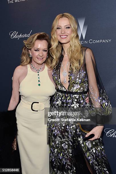 Chopard Co-President & Artistic Director Caroline Scheufele and model Petra Nemcova attend The Weinstein Company's Pre-Oscar Dinner presented in...