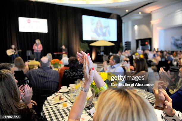 Guests enjoying Trisha Yearwood sing during the Southern Kitchen Brunch Hosted By Trisha Yearwood - Part of The NYT Cooking Series during 2016 Food...