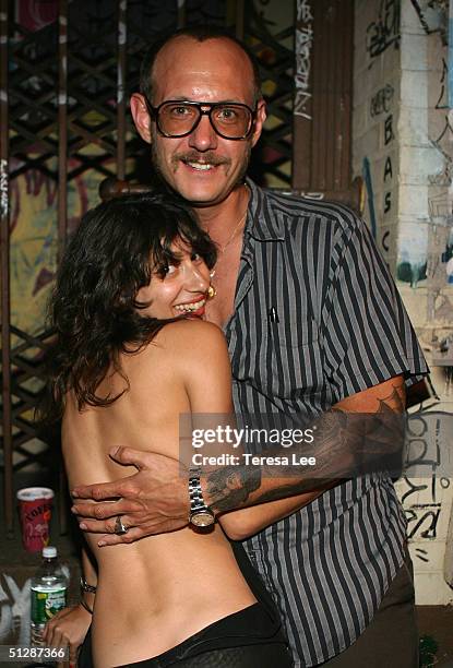 Artist Terry Richardson and his girlfriend Alex Bolotow attend the Terry Richardson Gallery opening at Deitch September 10, 2004 in New York City.