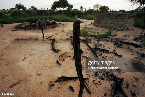 The smouldering remains of the village of Chero Kasi are seen here September 8 a day after it was set ablaze by Janjaweed militiamen in the violence...