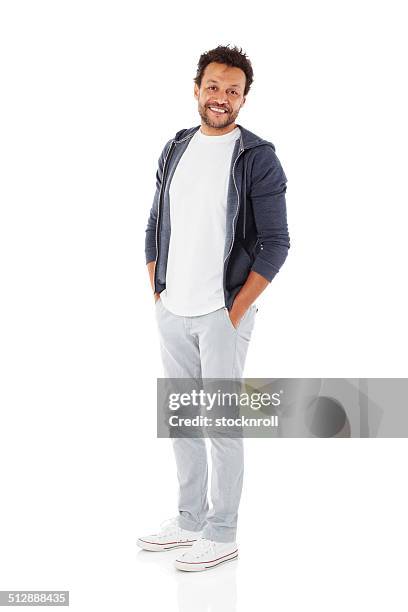 reifer mann posieren in casuals - relaxing white background stock-fotos und bilder