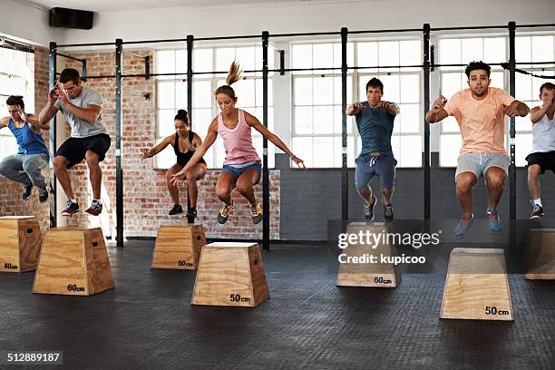 getting the jump on good health - group gym class bildbanksfoton och bilder