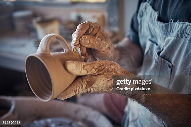 every cup he makes is unique - ceramics 個照片及圖片檔