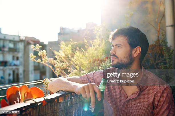 savoring the sunshine and some beer - young men drinking beer stock pictures, royalty-free photos & images