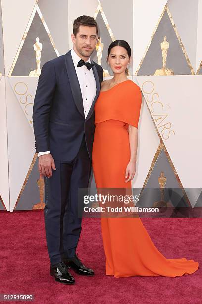 Player Aaron Rodgers and actress Olivia Munn attend the 88th Annual Academy Awards at Hollywood & Highland Center on February 28, 2016 in Hollywood,...