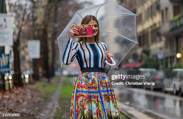 Thassia Naves wearing Dolce & Gabbana skirt, shoes, top and bag seen outside Dolce & Gabbana during Milan Fashion Week Fall/Winter 2016/17 on...