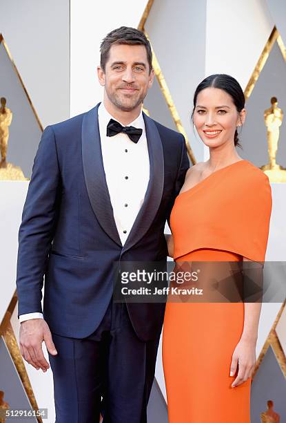 Actress Olivia Munn and NFL player Aaron Rodgers attend the 88th Annual Academy Awards at Hollywood & Highland Center on February 28, 2016 in...