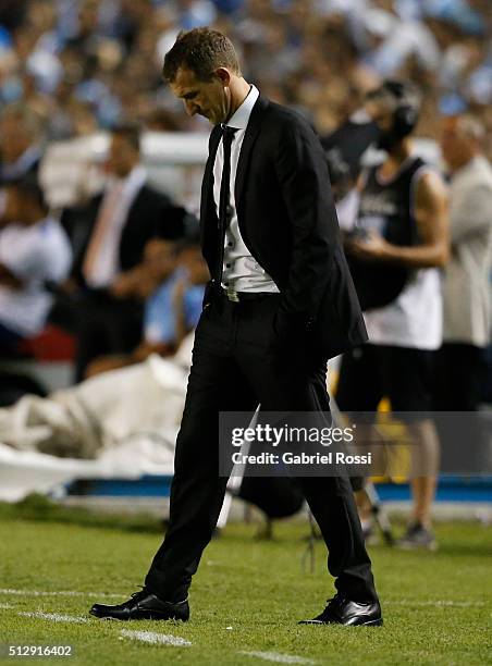 Rodolfo Arruabarrena coach of Boca Juniors looks dejected during a fifth round match between Racing Club and Boca Juniors as part of Torneo...